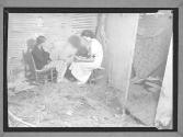 [Nurse with Flood Victim]
