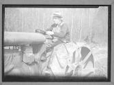 [Portrait of a Man on a Tractor]