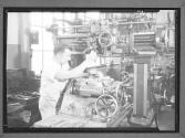 Mechanics Man Working at Drill Press