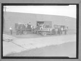 [Men with Wagons]