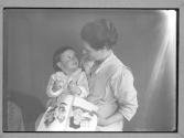 [Woman with Laughing Baby]