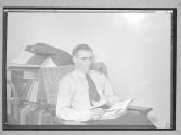 [Man reading]
