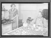 [Man and Woman Eating Breakfast]