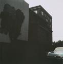 [Architectural view with car]