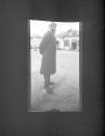 [Figure on a street]