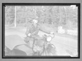 [Motorcycle Policeman]