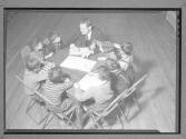 [Teacher Reading to Children]