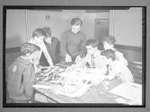[Boys Making Model Airplanes]