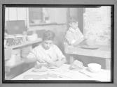 [Two Boys Making Pottery]