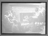 [Children Around Fireplace]