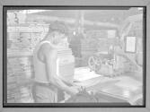 [Man Working with Wood]