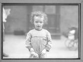 [Portrait of Child in Street]