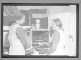 [Girl Scouts baking]