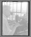 [Man Sewing]