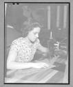 [Woman Sewing]