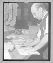 [Older Man with Cloth]