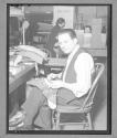 [Man Hand-Sewing]