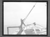 Workman on Pulley