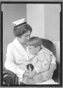 [Child with Nurse]
