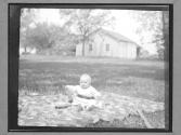 [Baby on Quilt]