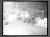 [Workers Stoking Furnace]