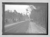 [prison laborers working on road]