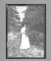 [portrait of woman in garden]