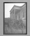 [automen on the steps of old estate]