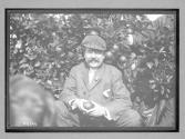 [portrait of man in garden]