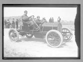 [auto racers at track]