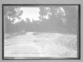 [auto driving on country road]