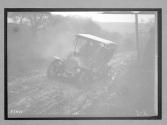 [auto tour driving through mud]
