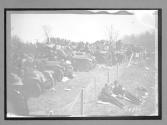 [spectators' autos parked at race]