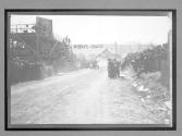 [auto racing across start-finish line "#2"]