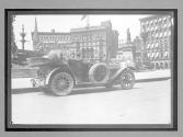 [auto in city street]