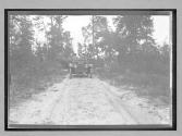 [auto driving on country road]