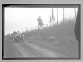 [auto driving on country road "NY38773"]