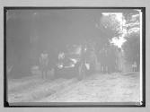 [auto tourists with local people "Chalmers Press Car"]