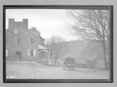 [auto in front of "Richmond Hotel"]