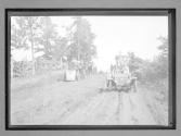 [auto driving on country road]
