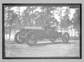 [auto driving on country road "The Acme"]