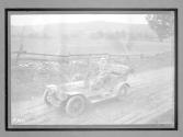 [auto tour driving on country road]