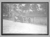 [auto parked on side of road "#5"]