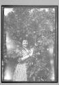 [portrait of woman in garden]