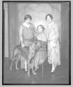 [Helen Keller, her teacher Anne Sullivan Macy, woman and large dog]