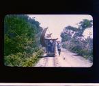 Formosa [22] (Two men push gravity-sail car to the picket line of the Head Hunters' Country)