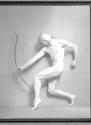 [Male dancer, nude with bow and helmut]