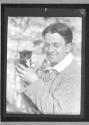 [Alvin Langdon Coburn holding kitten]