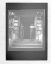 Two men in doorway of Rooming House