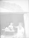 [Woman and Child in Tent]